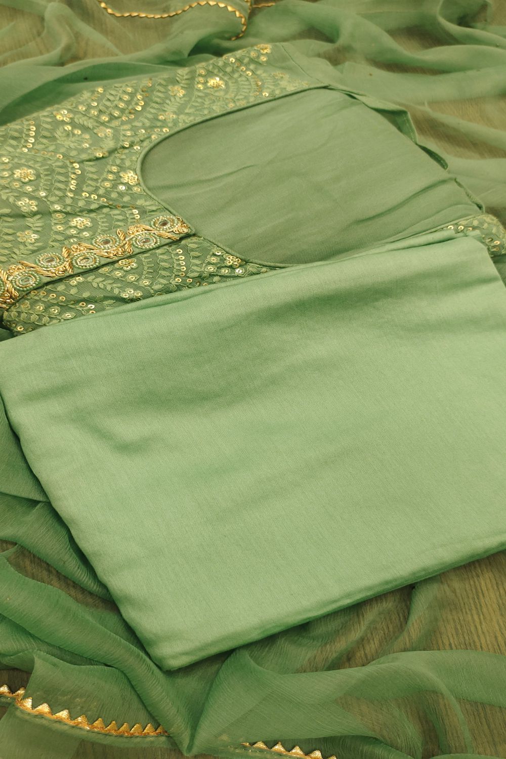 Sea Green Georgette Sequins Embroidered Semi Stitched Salwar Suits